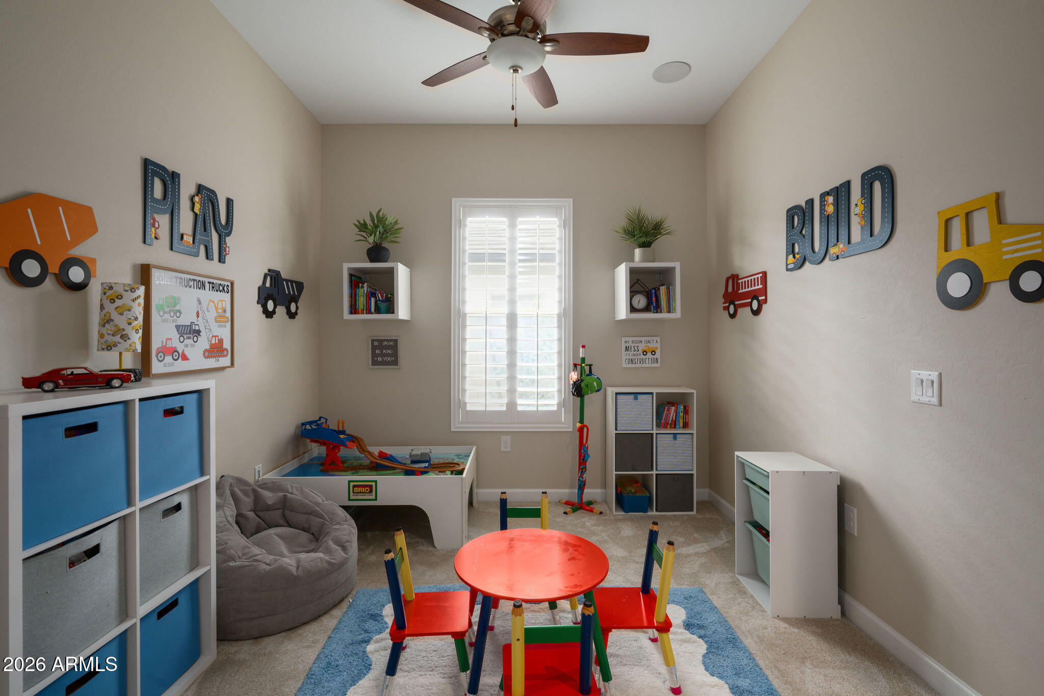 18236 North 66th Way Phoenix, AZ 85054 - Photo 13 of 17 a living room with furniture and a window