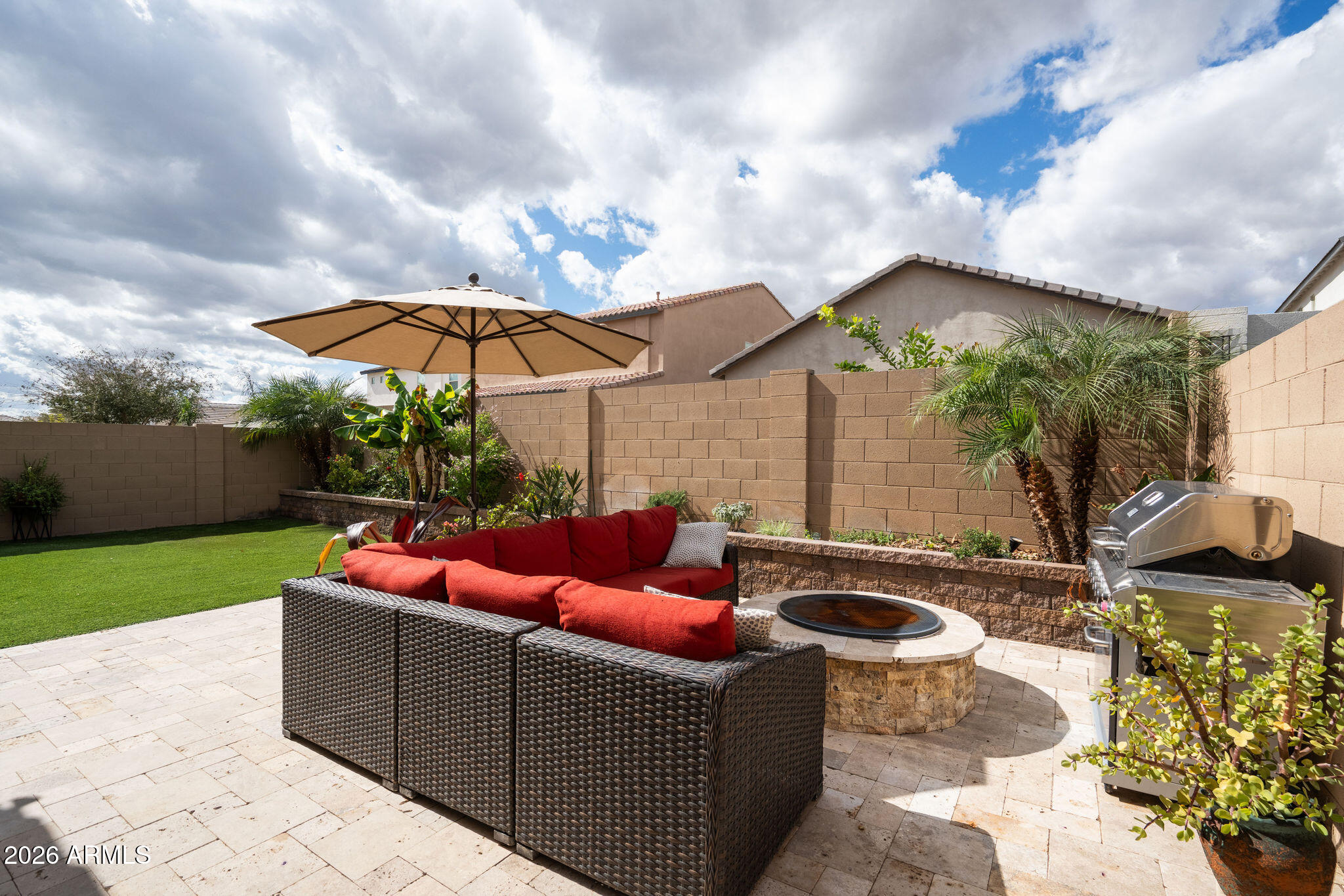 18236 North 66th Way Phoenix, AZ 85054 - Photo 17 of 17 a view of a backyard with swimming pool and furniture