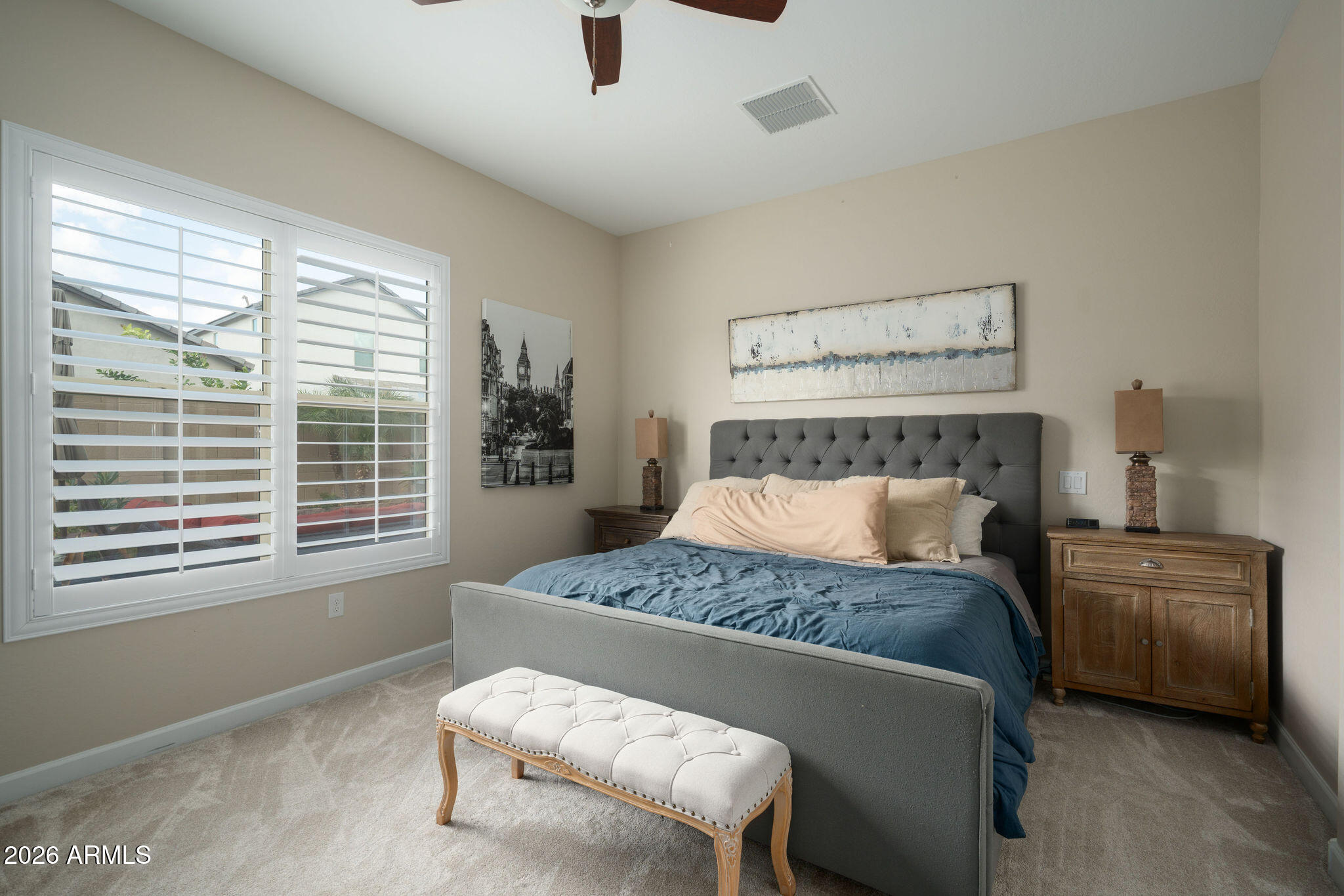 18236 North 66th Way Phoenix, AZ 85054 - Photo 5 of 17 a bedroom with a bed and window