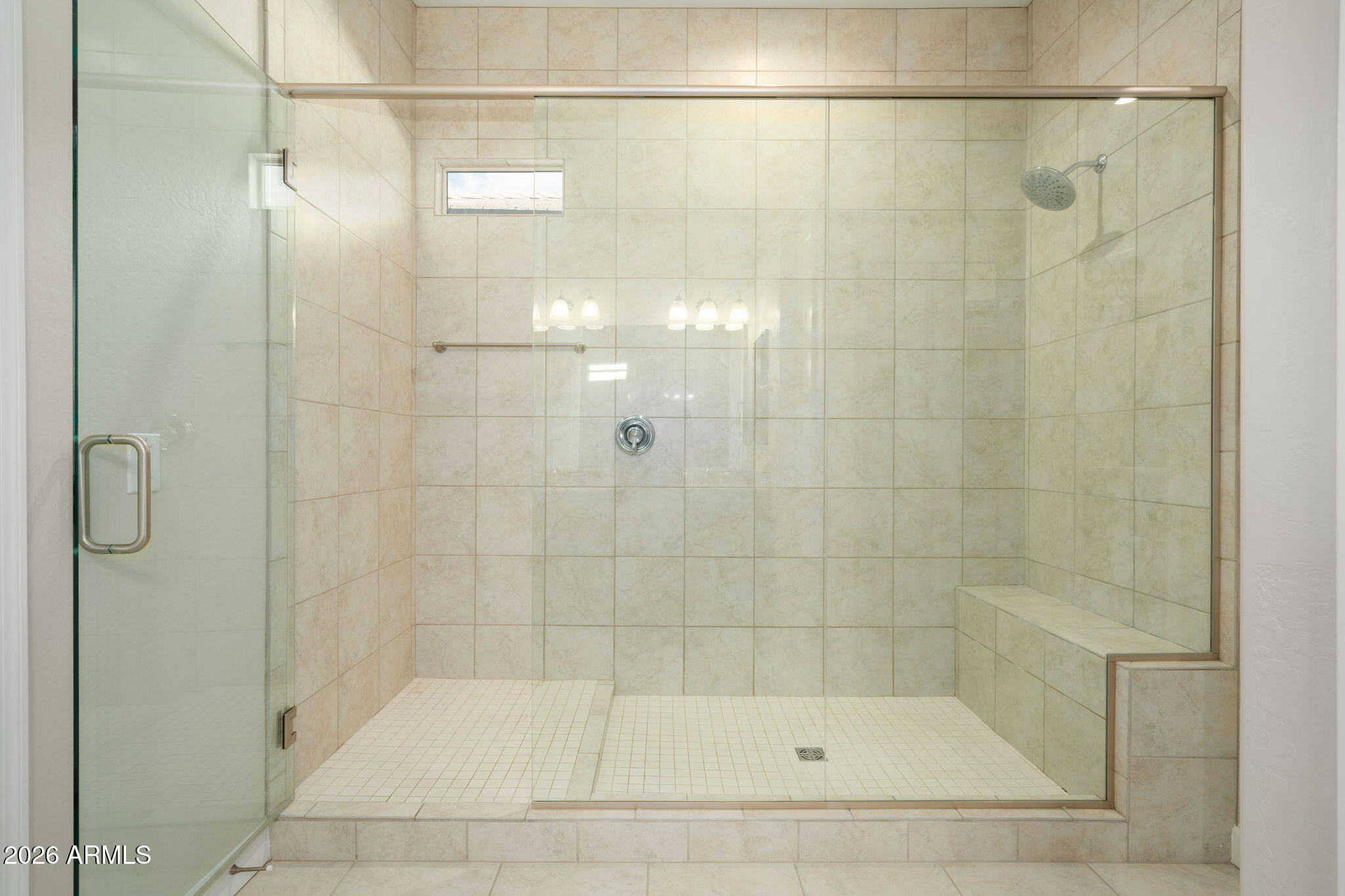 18236 North 66th Way Phoenix, AZ 85054 - Photo 7 of 17 a bathroom with a shower and a bath tub