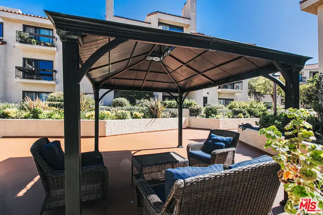 a view of a building with a street