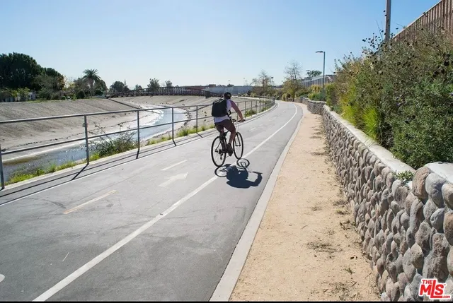 a view of a ocean with a building in the background