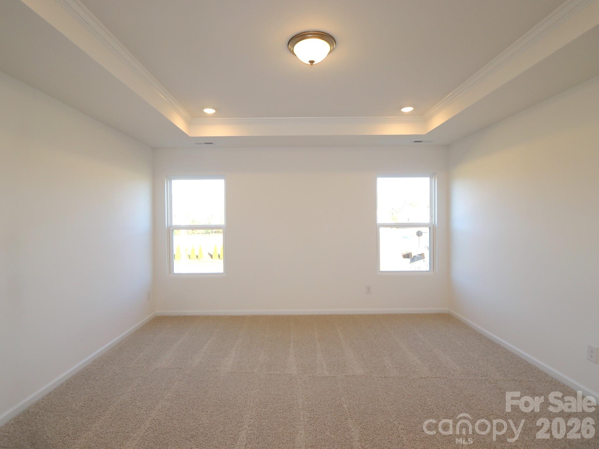 1110 Overbrook Place Wingate, NC 28174 - Photo 16 of 21 an empty room with windows