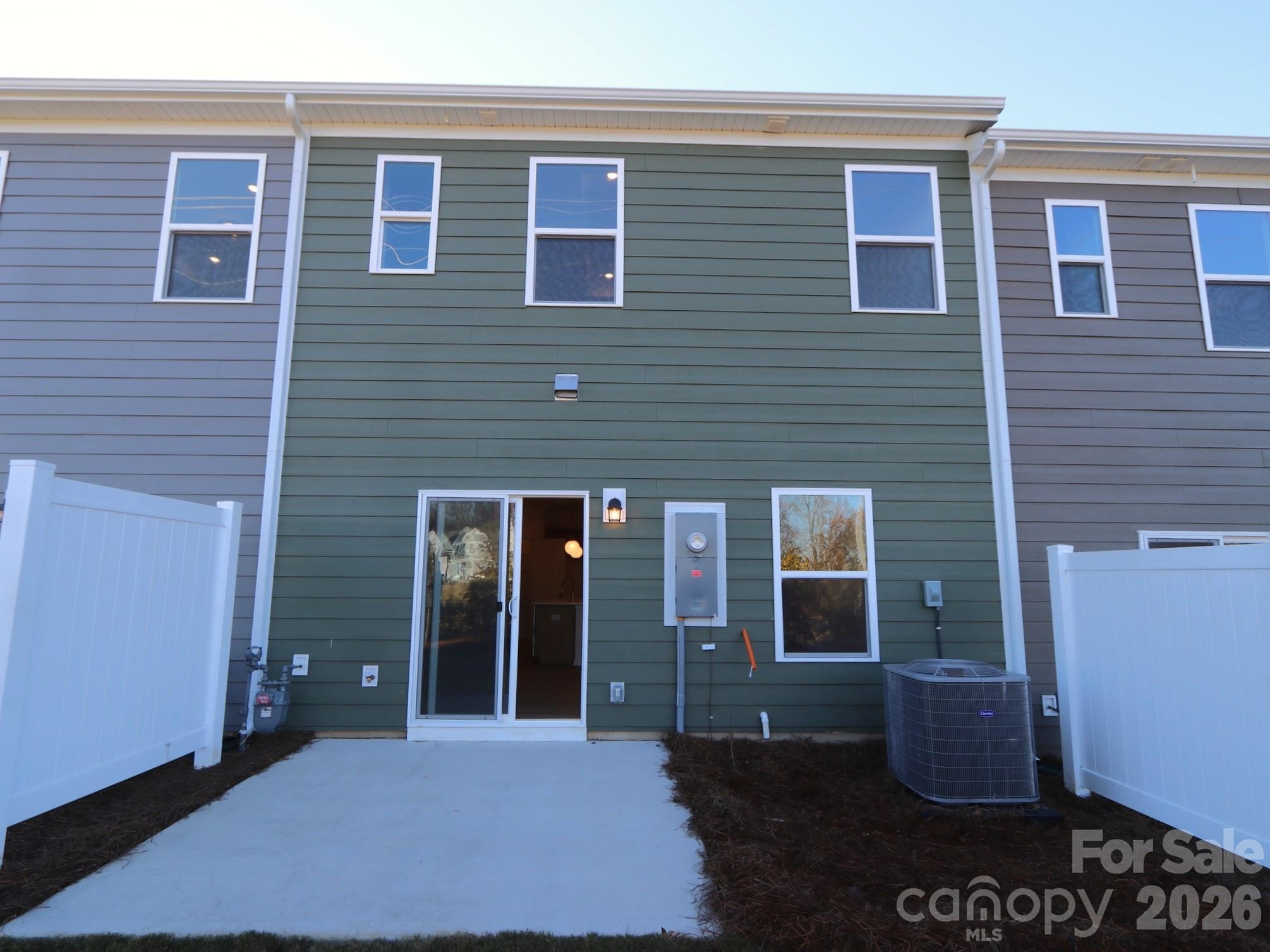 1110 Overbrook Place Wingate, NC 28174 - Photo 2 of 21 a view of a brick house with large windows