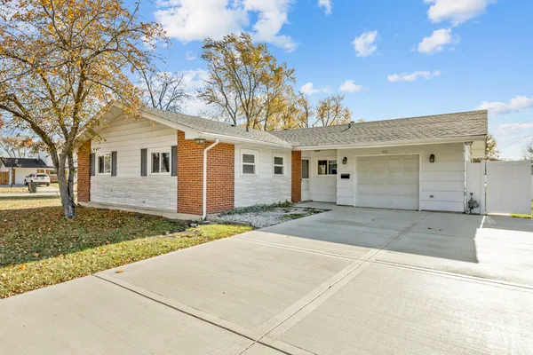 front view of a house with a patio