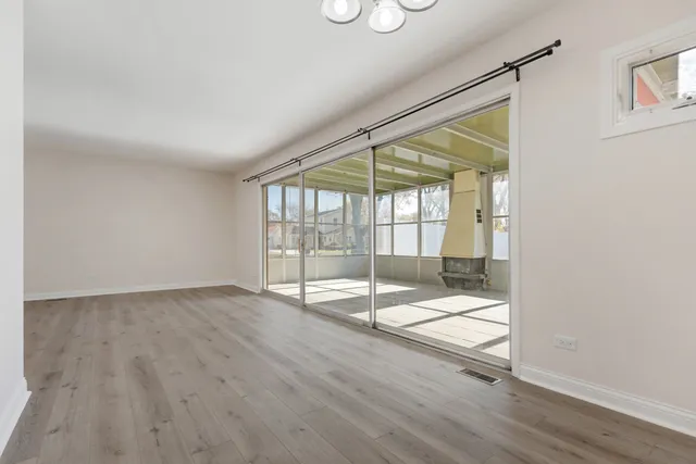 a view of an empty room and window