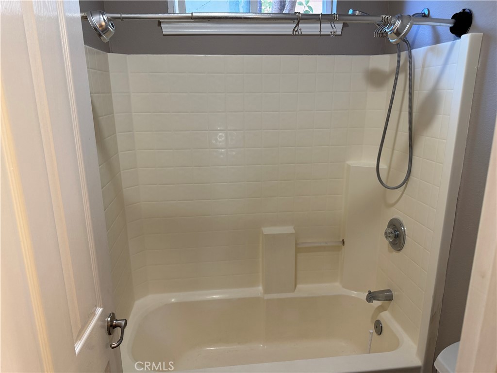 1041 Raven Lane Chico, CA 95926 - Photo 13 of 19 a bathroom with a bath tub