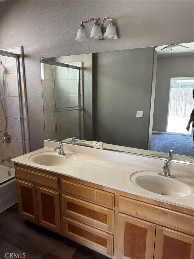 1041 Raven Lane Chico, CA 95926 - Photo 16 of 19 a bathroom with a sink and a mirror