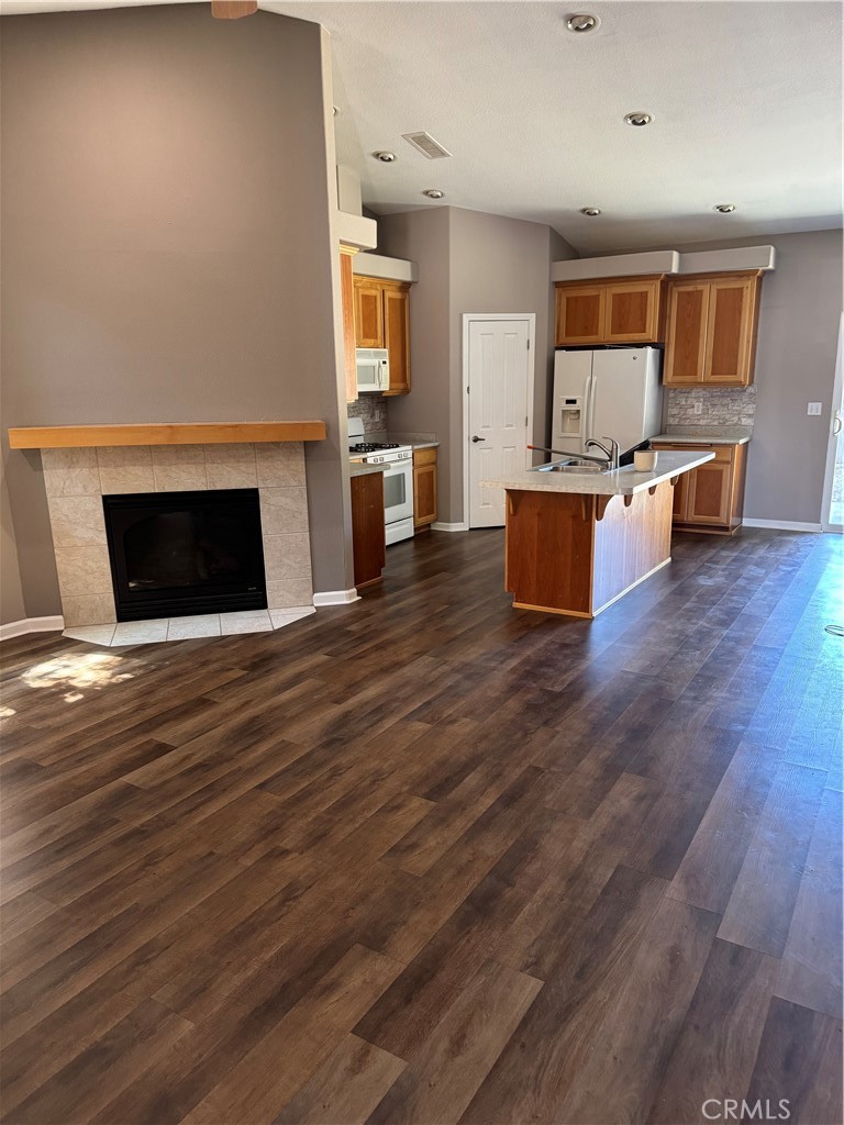 1041 Raven Lane Chico, CA 95926 - Photo 5 of 19 a living room with furniture and a fireplace