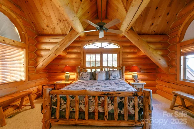 a bathroom with a double vanity sink mirror and toilet