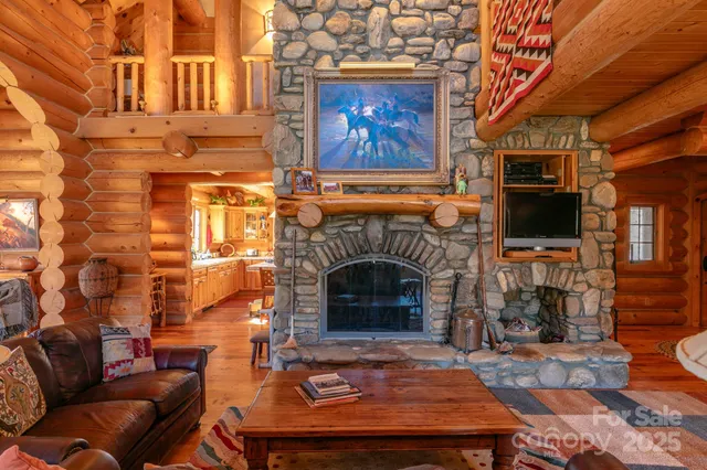 a kitchen with stainless steel appliances granite countertop a sink a stove and refrigerator