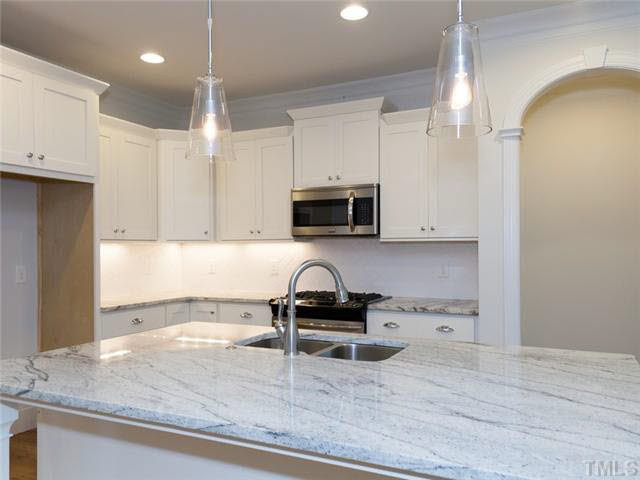2104 East Charlotte Court Raleigh, NC 27607 - Photo 7 of 23 Stainless steel upgraded appliance package... L and L's Design Team picked out some fabulous fixtures!