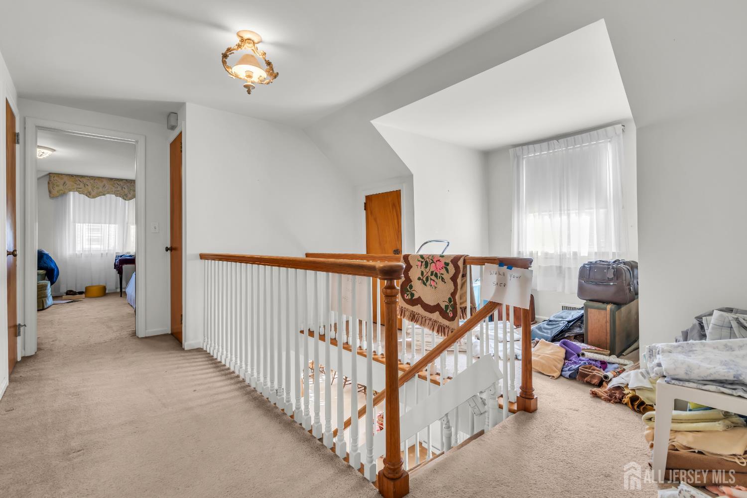 16 Stafford Road Colonia, NJ 07067 - Photo 23 of 41 a view of a hallway with workspace