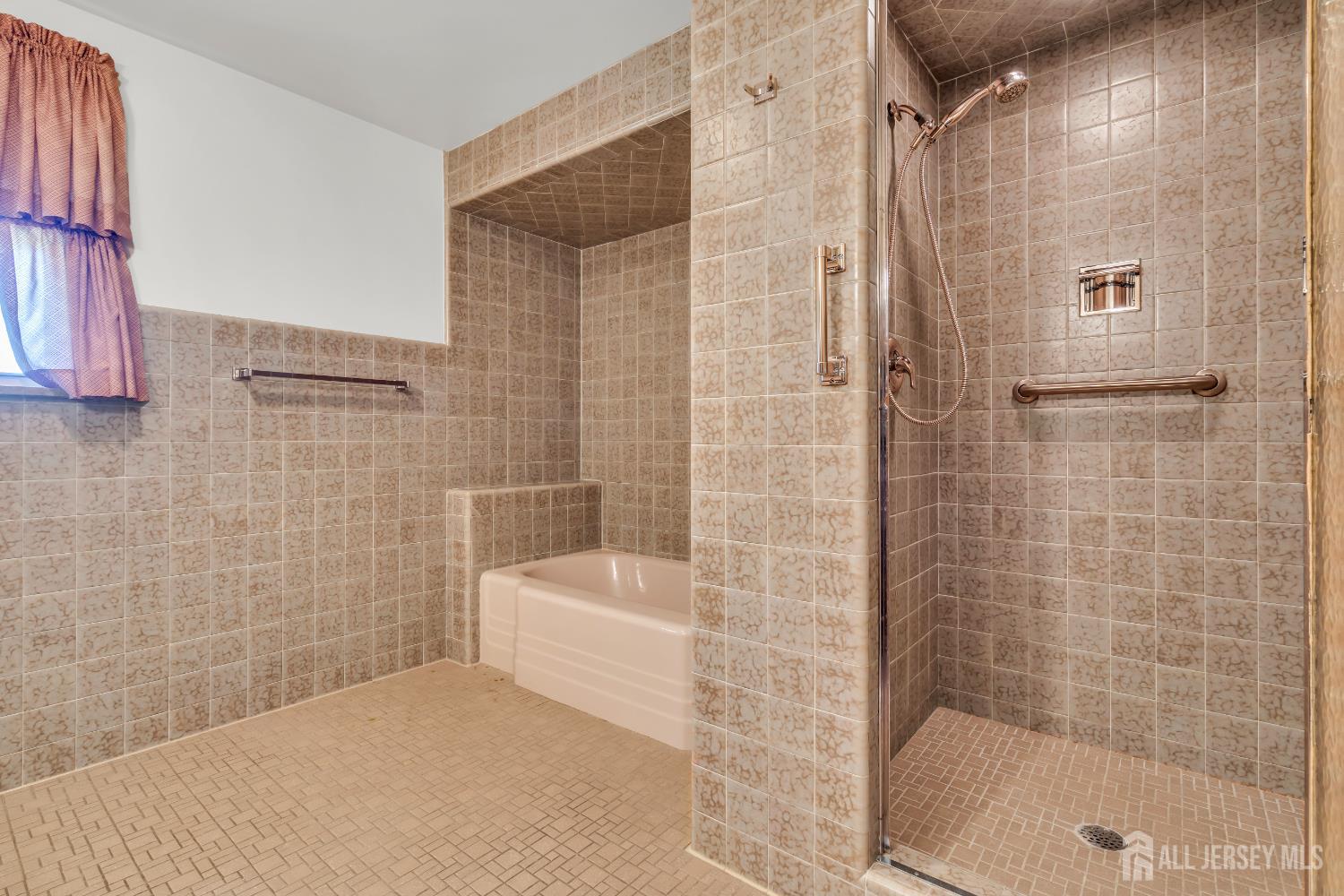 16 Stafford Road Colonia, NJ 07067 - Photo 27 of 41 a bathroom with a bathtub