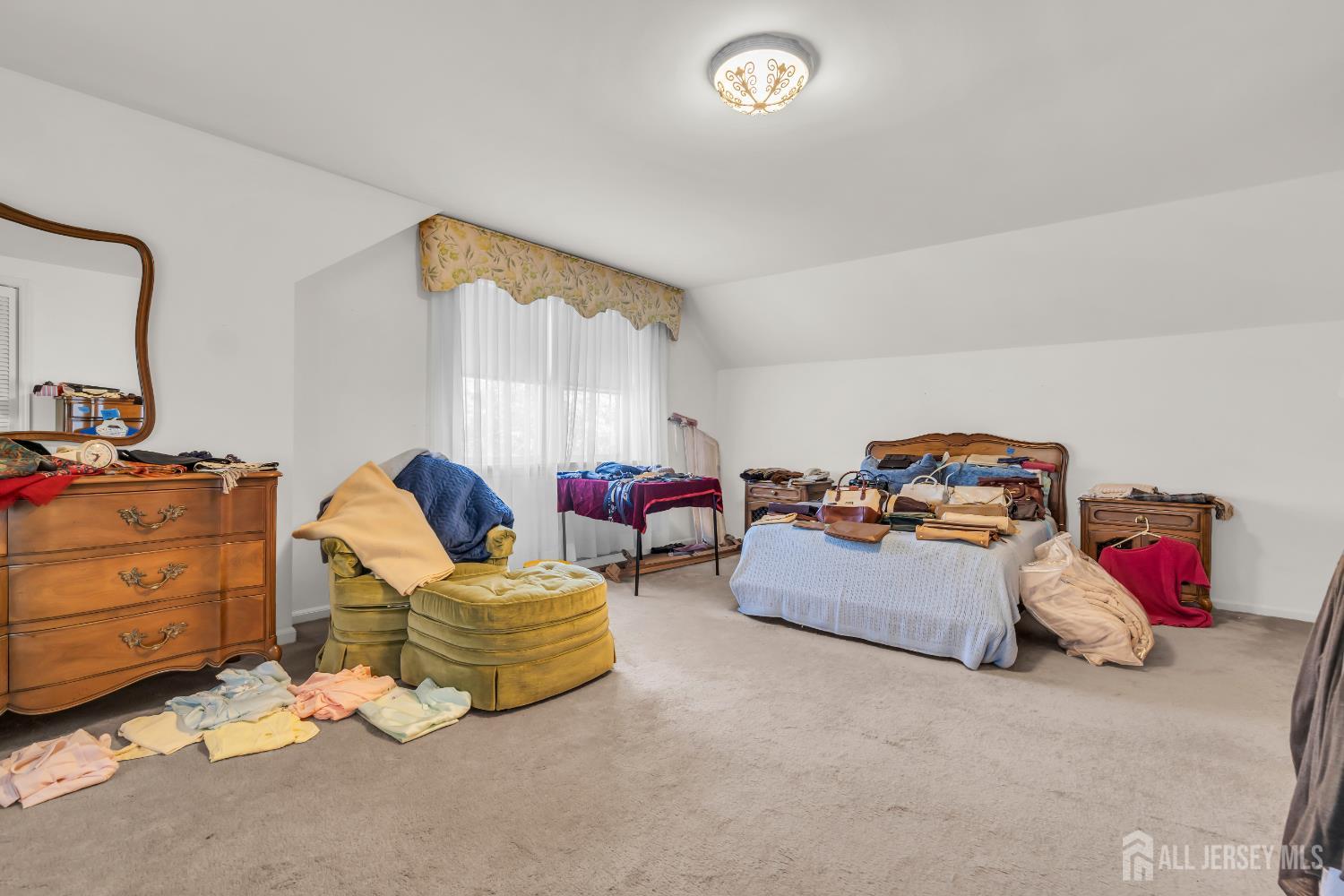 16 Stafford Road Colonia, NJ 07067 - Photo 28 of 41 a living room with furniture and a couch