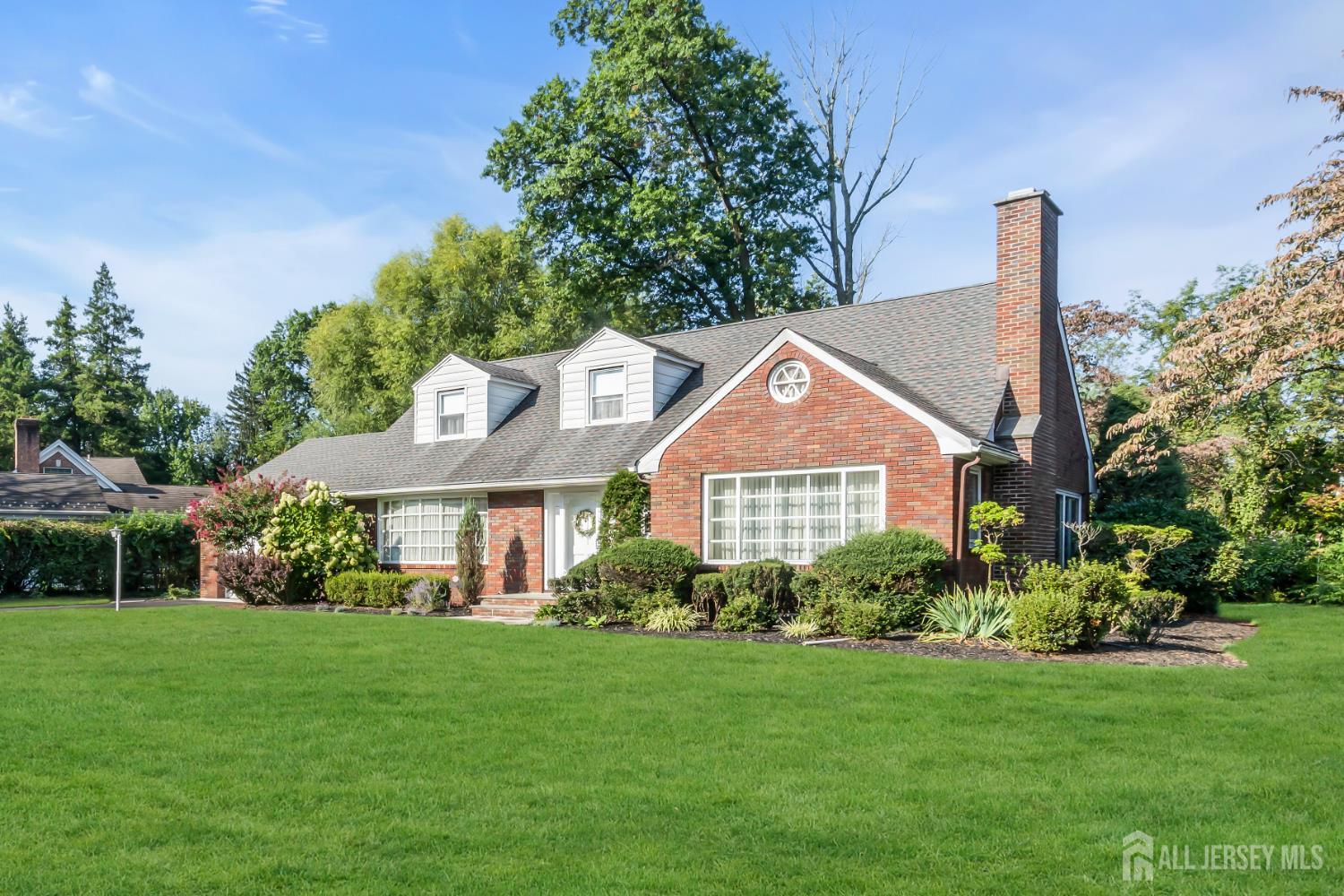 16 Stafford Road Colonia, NJ 07067 - Photo 3 of 41 a front view of a house with garden