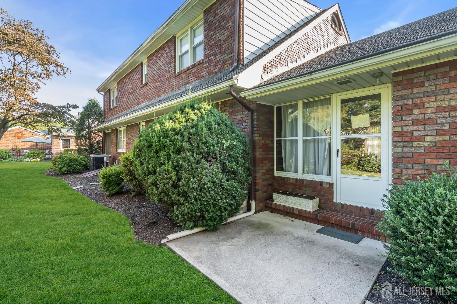 16 Stafford Road Colonia, NJ 07067 - Photo 36 of 41 a front view of a house with garden