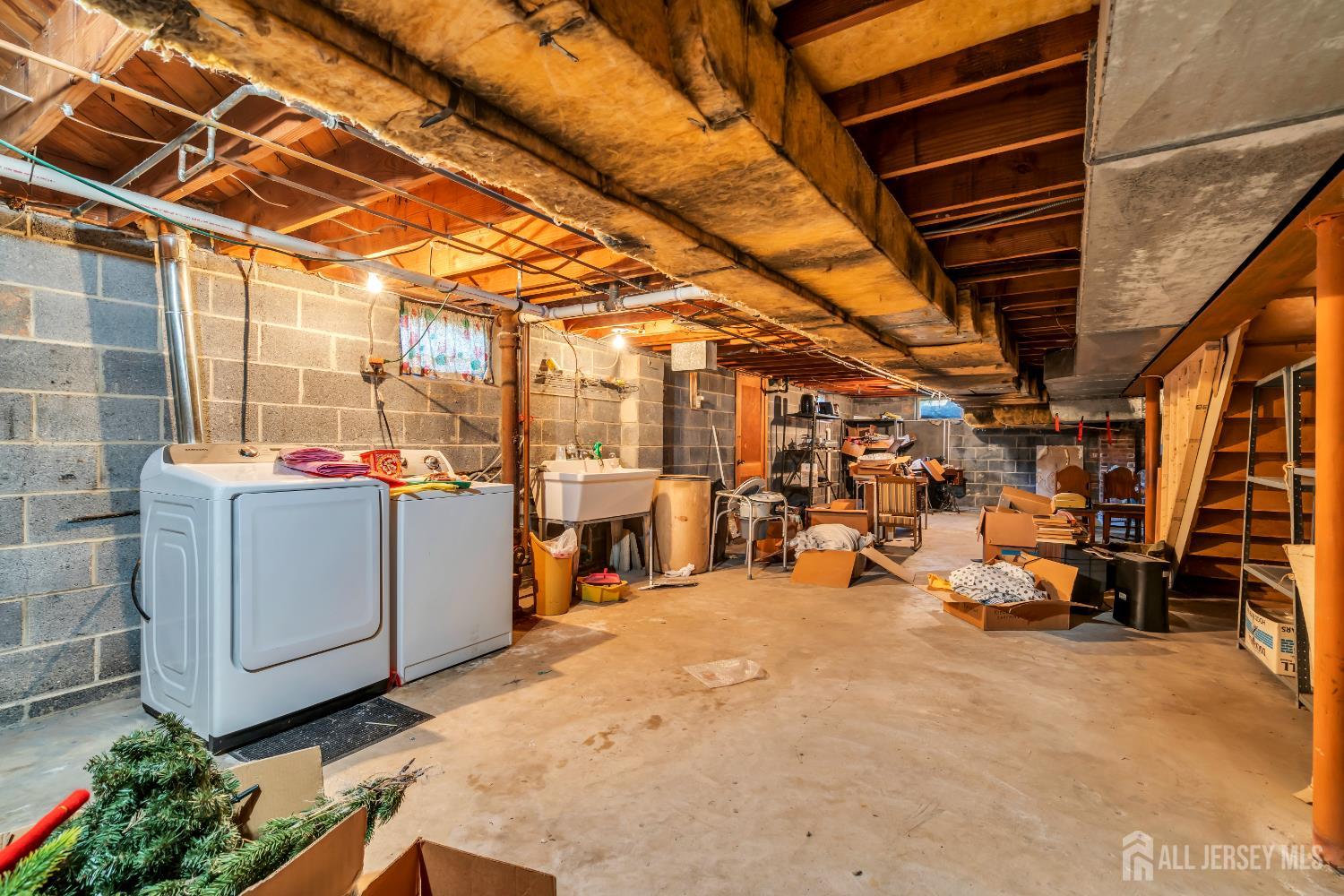 16 Stafford Road Colonia, NJ 07067 - Photo 39 of 41 a view of a storage room with a lot of stuff