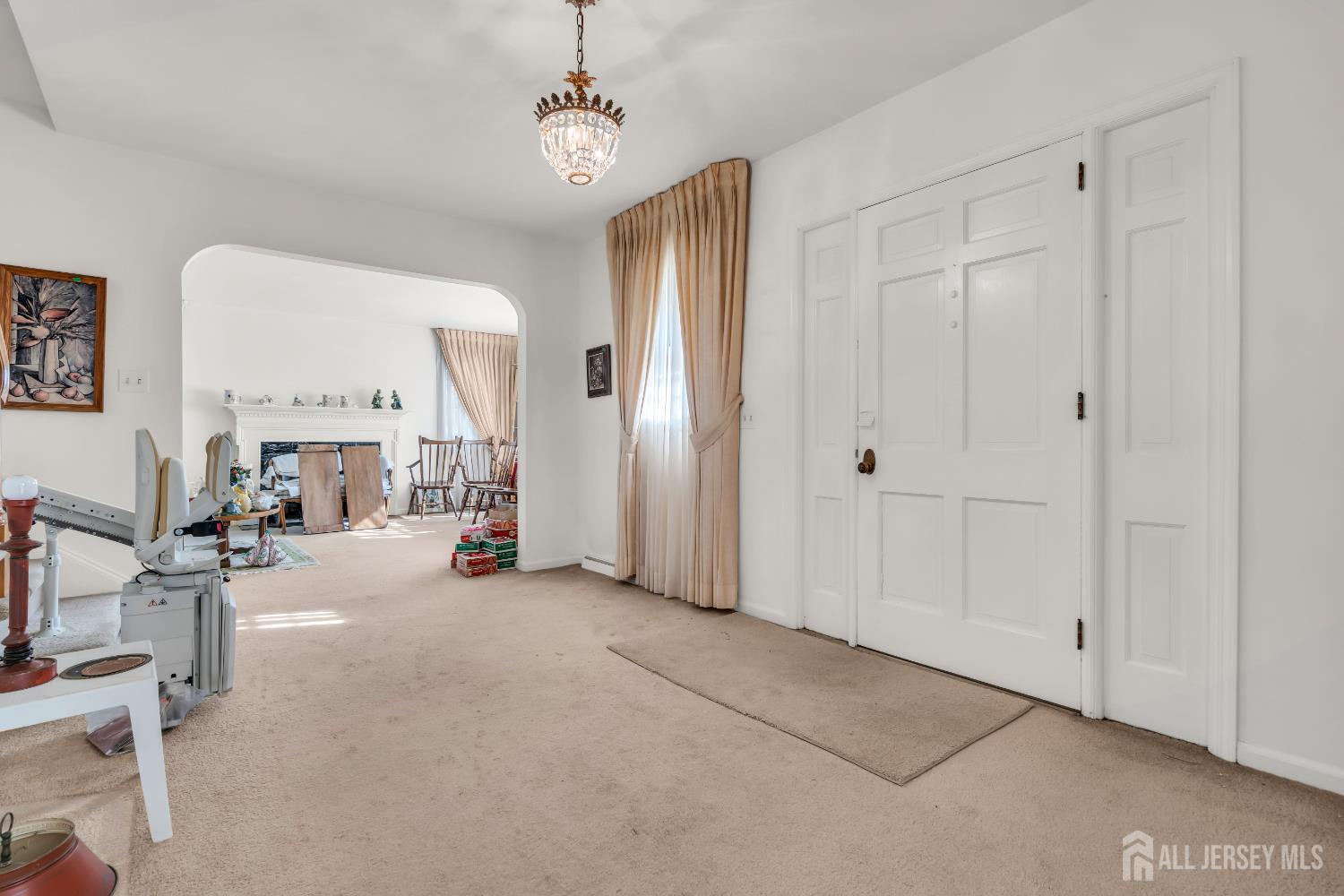 16 Stafford Road Colonia, NJ 07067 - Photo 6 of 41 a view of a livingroom with furniture and a window