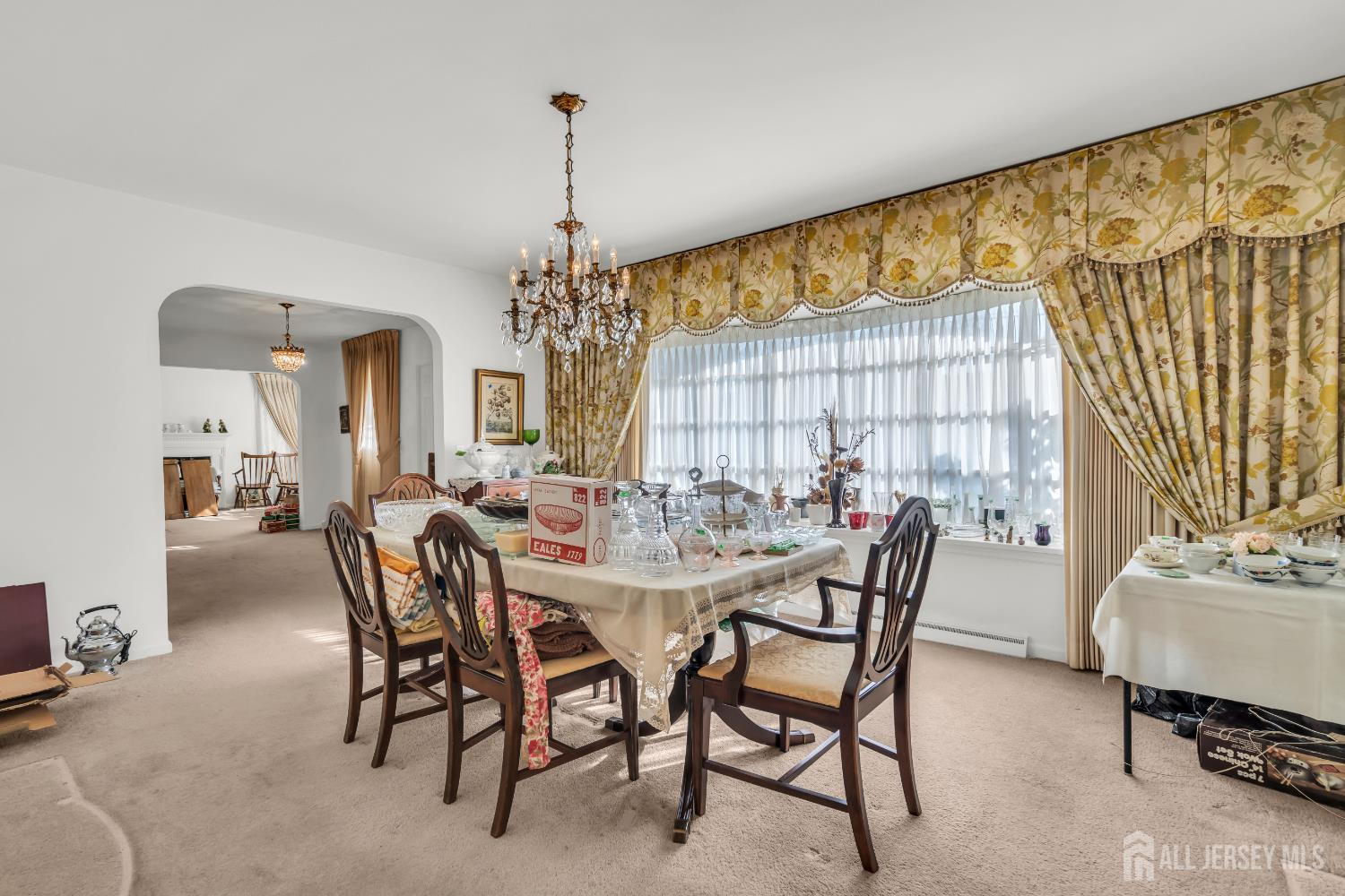 16 Stafford Road Colonia, NJ 07067 - Photo 10 of 41 a view of a dining room with furniture window and outside view