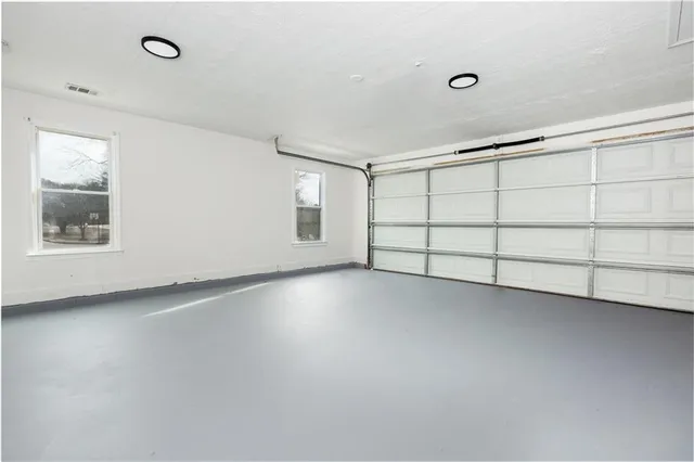 a view of a livingroom with an empty space and window