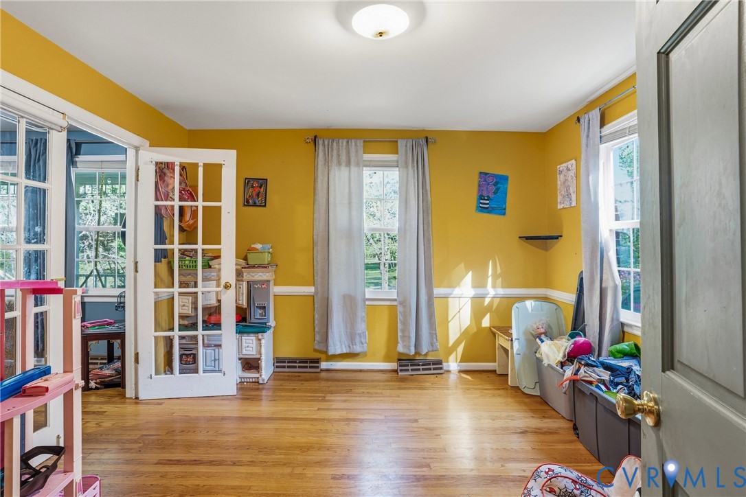 14219 Spruce Avenue Chester, VA 23836 - Photo 9 of 32 a view of an entryway with wooden floor