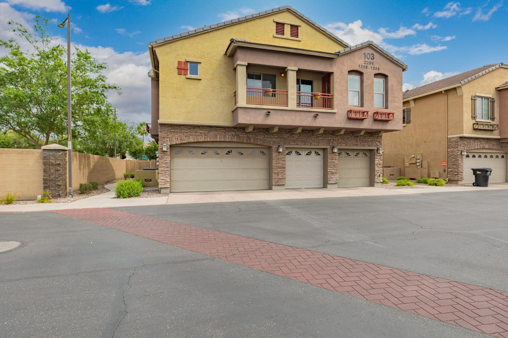 1350 South Greenfield Road, Unit 2205 Mesa, AZ 85206 - Photo 4 of 42 a view of a house with a street