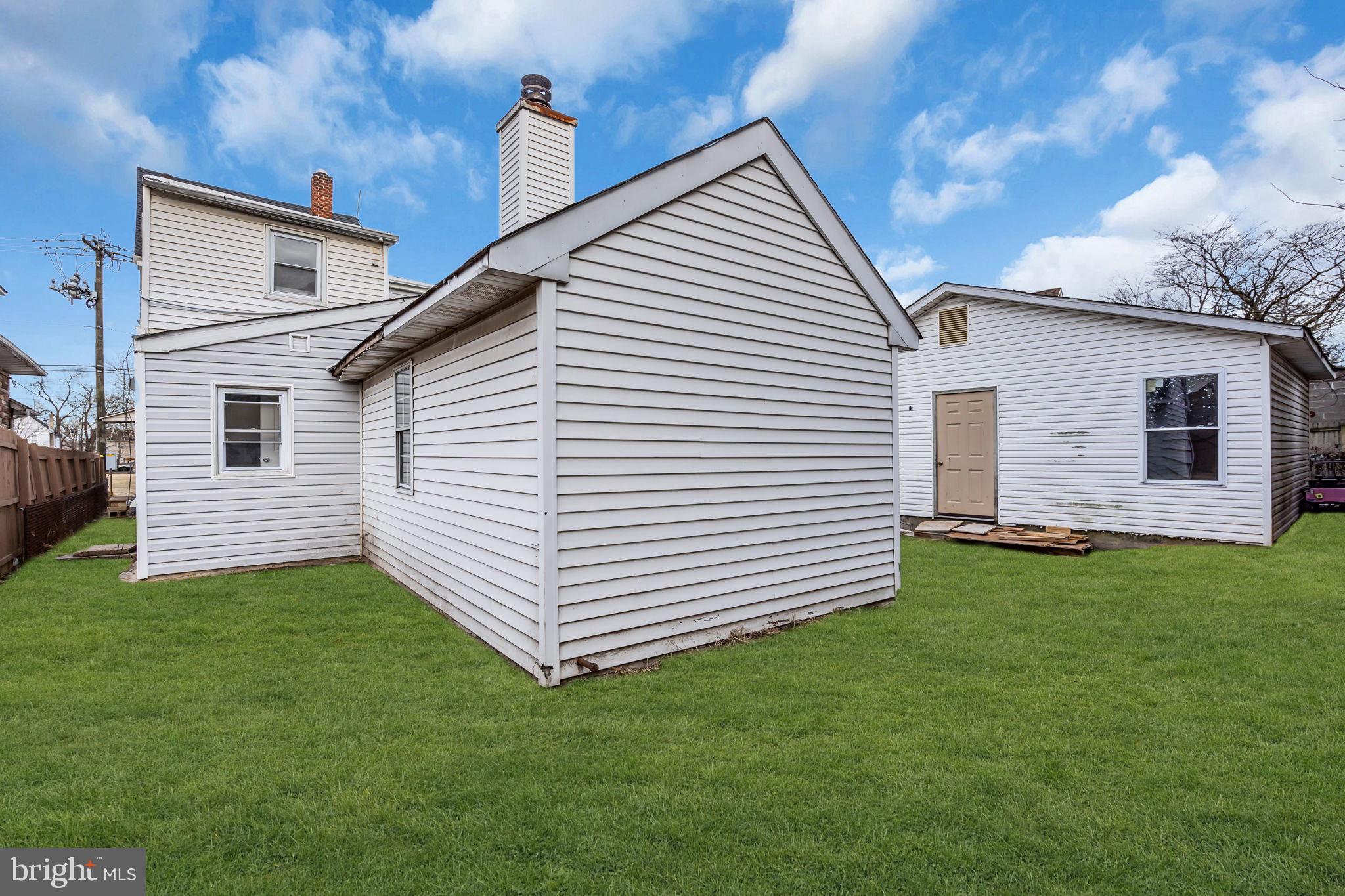 210 Kossuth Street, Unit B Riverside, NJ 08075 - Photo 8 of 10 a view of a backyard with plants and a garden