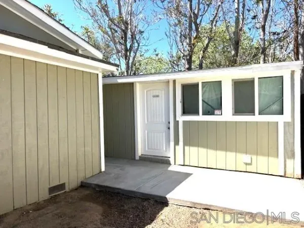a view of a house with a outdoor space