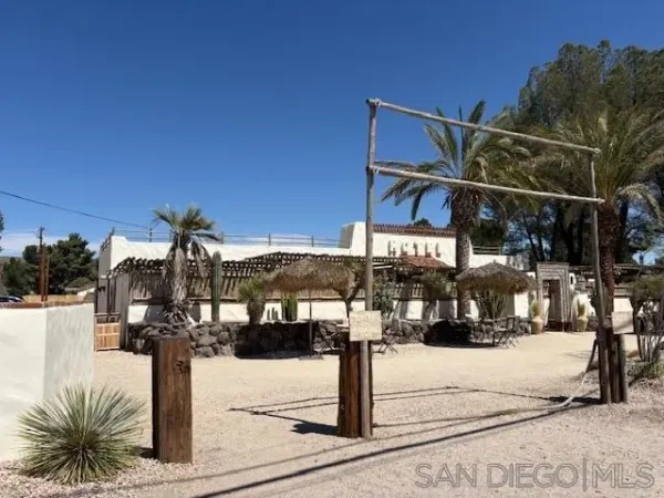 a street sign on a side of building