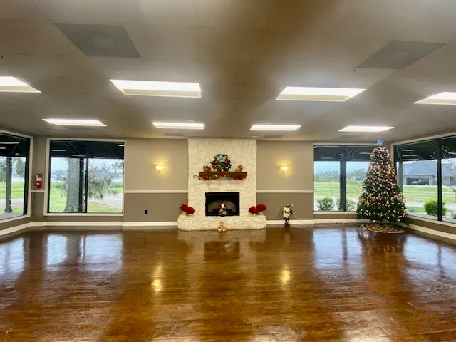 a view of a kitchen with granite countertop a large counter top and a stove