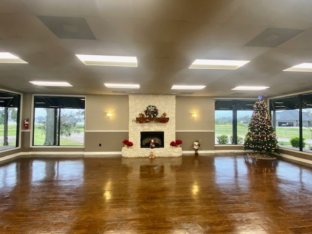 218 Cattle Drive Trail Angleton, TX 77515 - Photo 22 of 34 a living room with fireplace furniture and a large window