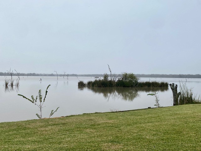 218 Cattle Drive Trail Angleton, TX 77515 - Photo 29 of 34 a view of a lake