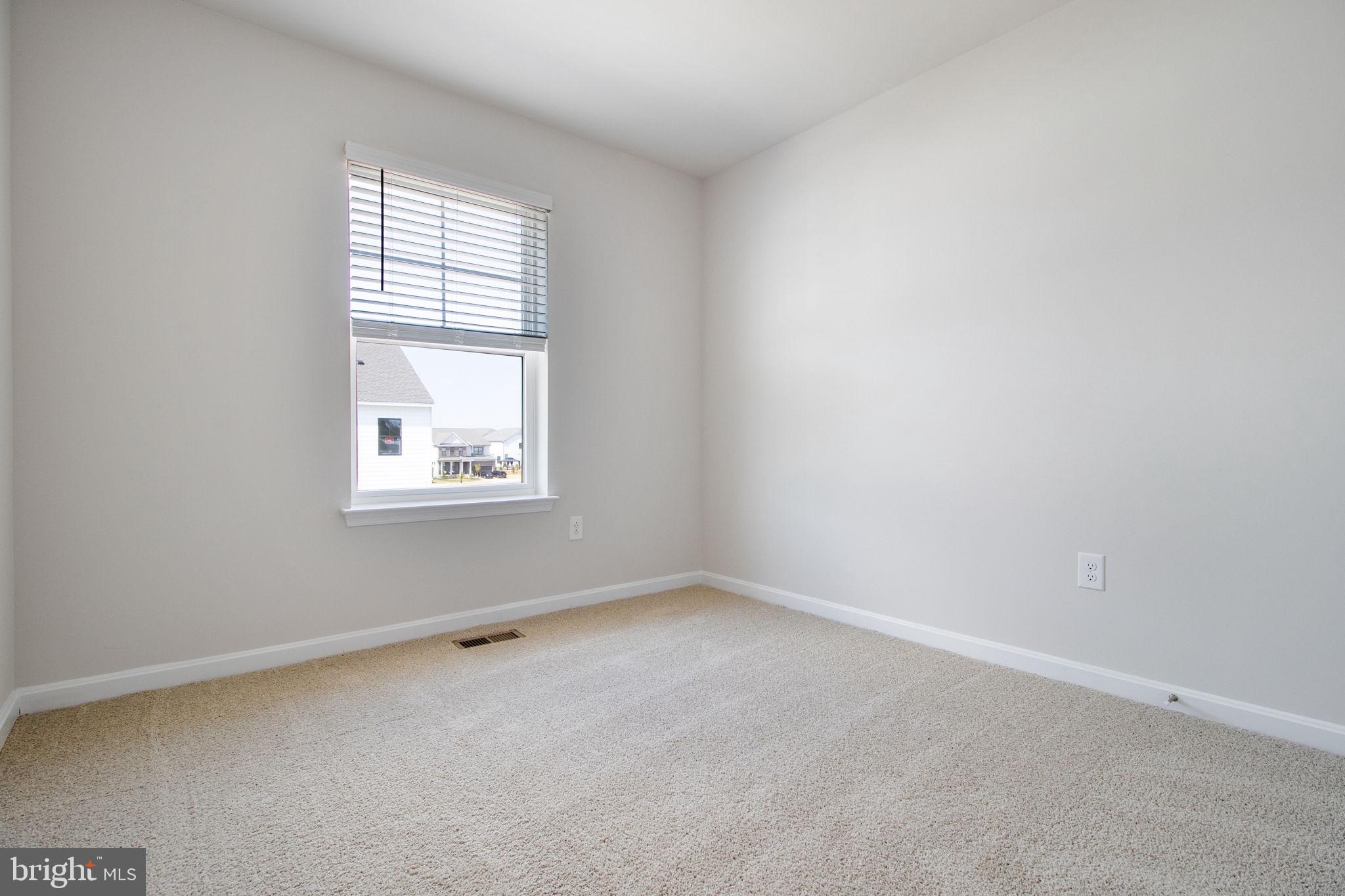 280 Ensemble Way Frederick, MD 21701 - Photo 12 of 25 an empty room with windows