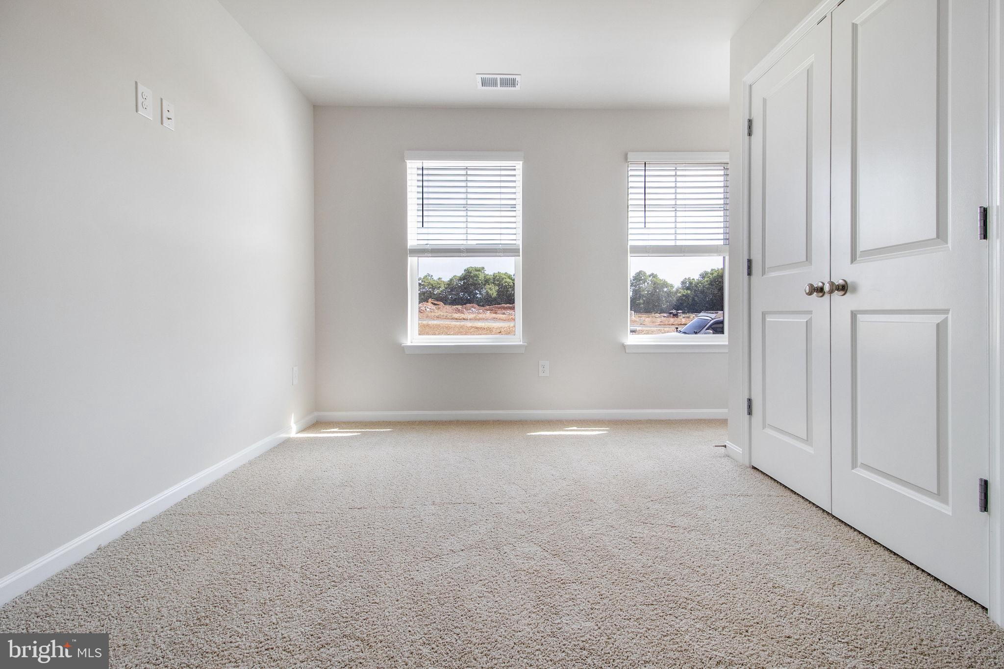 280 Ensemble Way Frederick, MD 21701 - Photo 17 of 25 an empty room with windows