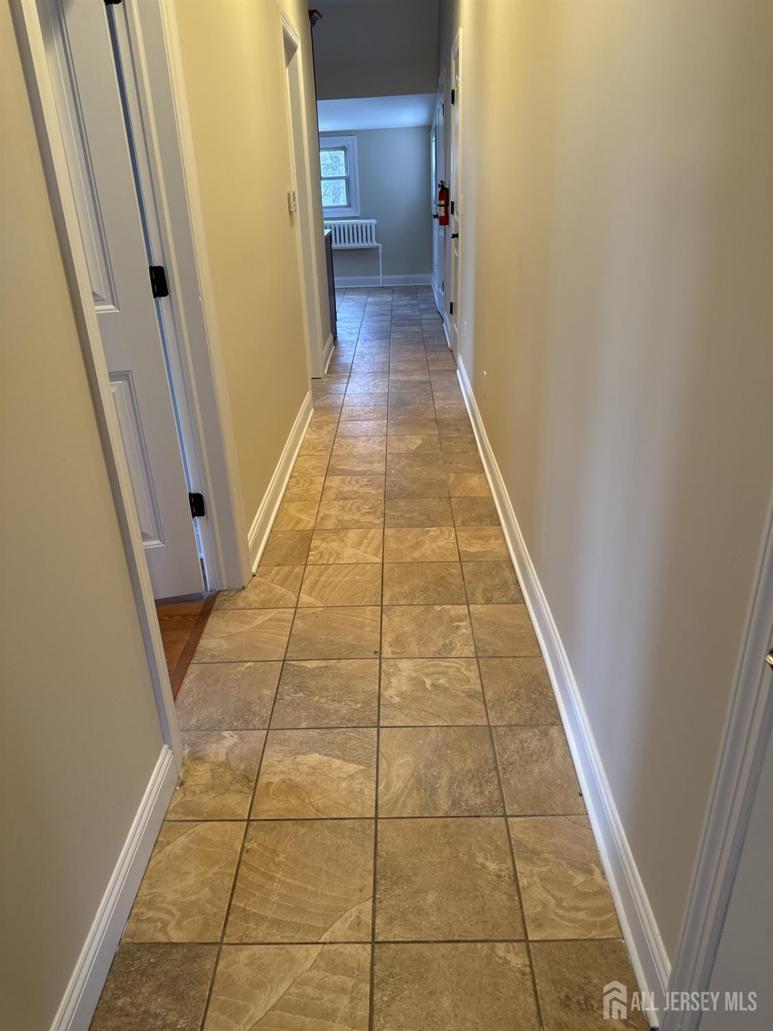 472 Cliff Road, Unit 3 Sewaren, NJ 07077 - Photo 15 of 16 a view of a hallway
