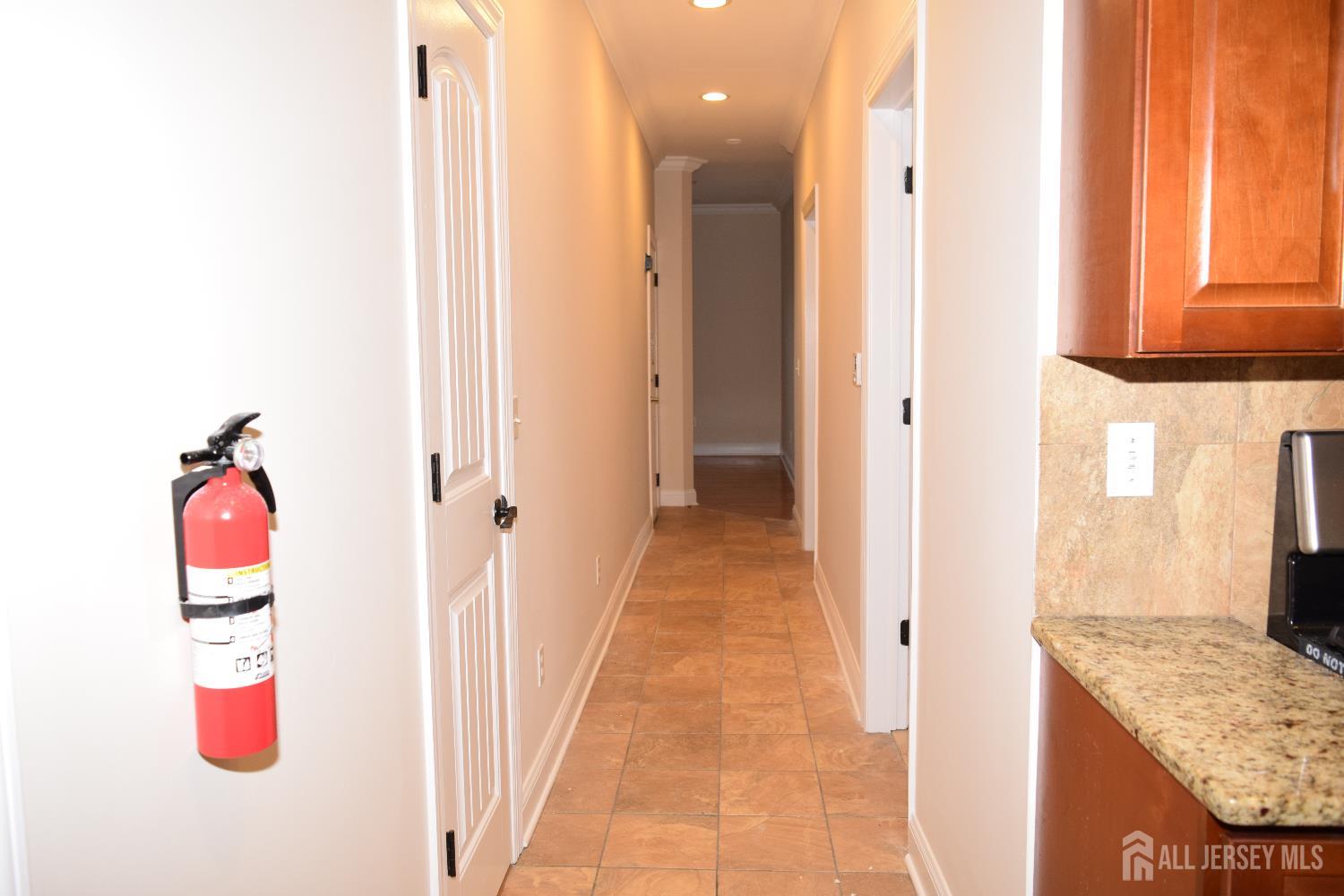 472 Cliff Road, Unit 3 Sewaren, NJ 07077 - Photo 10 of 16 a bathroom with a sink and a mirror