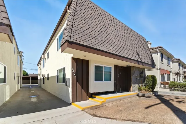 a view of a house with a patio