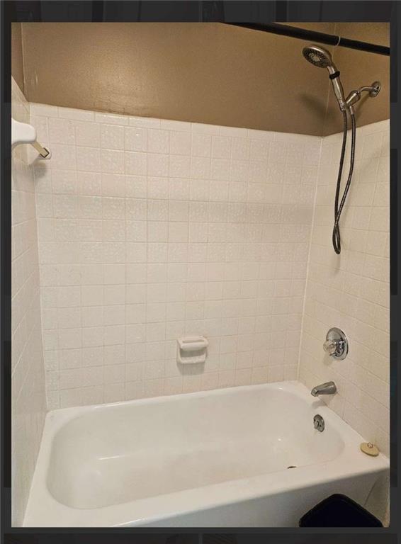 2539 Oakridge Place Decatur, GA 30033 - Photo 14 of 14 a bathroom with a shower and a bath tub