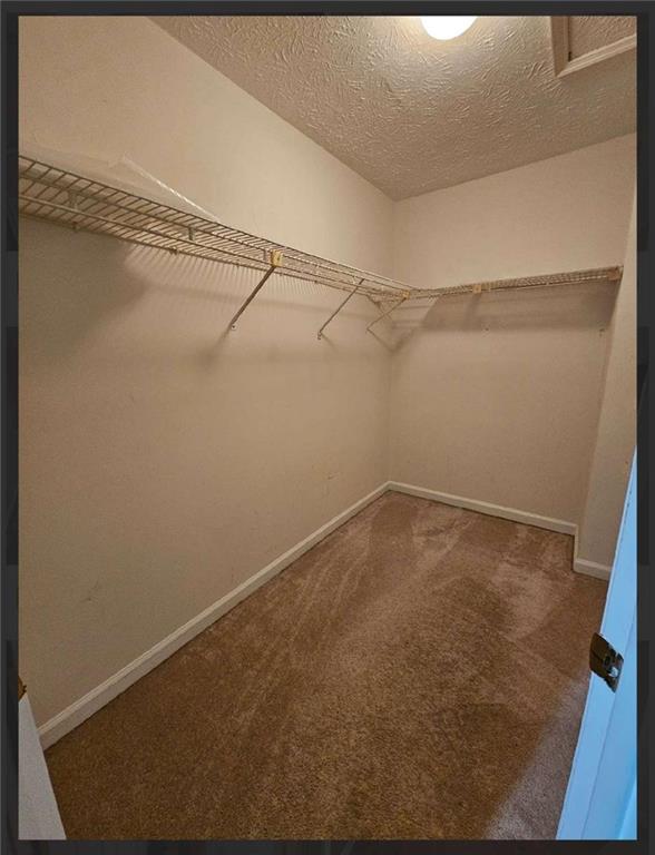 2539 Oakridge Place Decatur, GA 30033 - Photo 8 of 14 a view of a room with racks on the wall