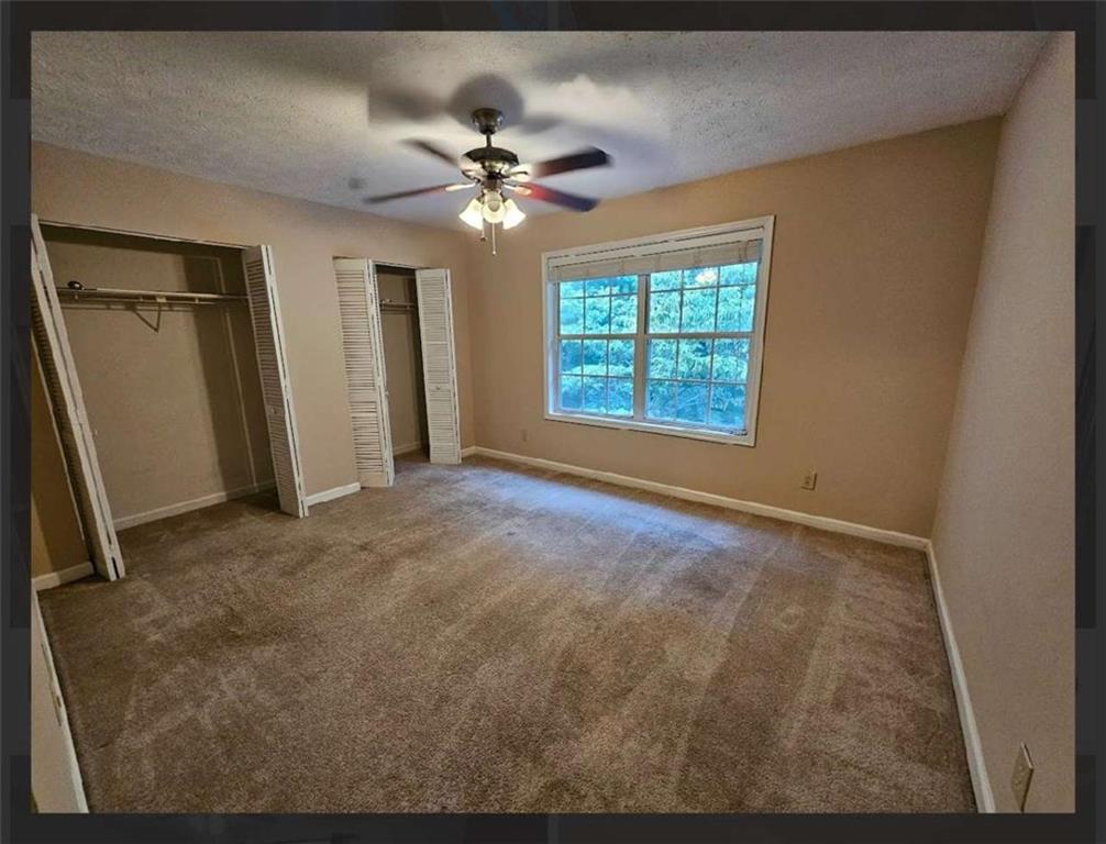 2539 Oakridge Place Decatur, GA 30033 - Photo 9 of 14 a view of an empty room with a window