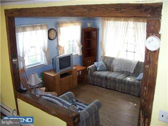 181 Walters Road Bridgeton, NJ 08302 - Photo 3 of 9 a living room with furniture and a window