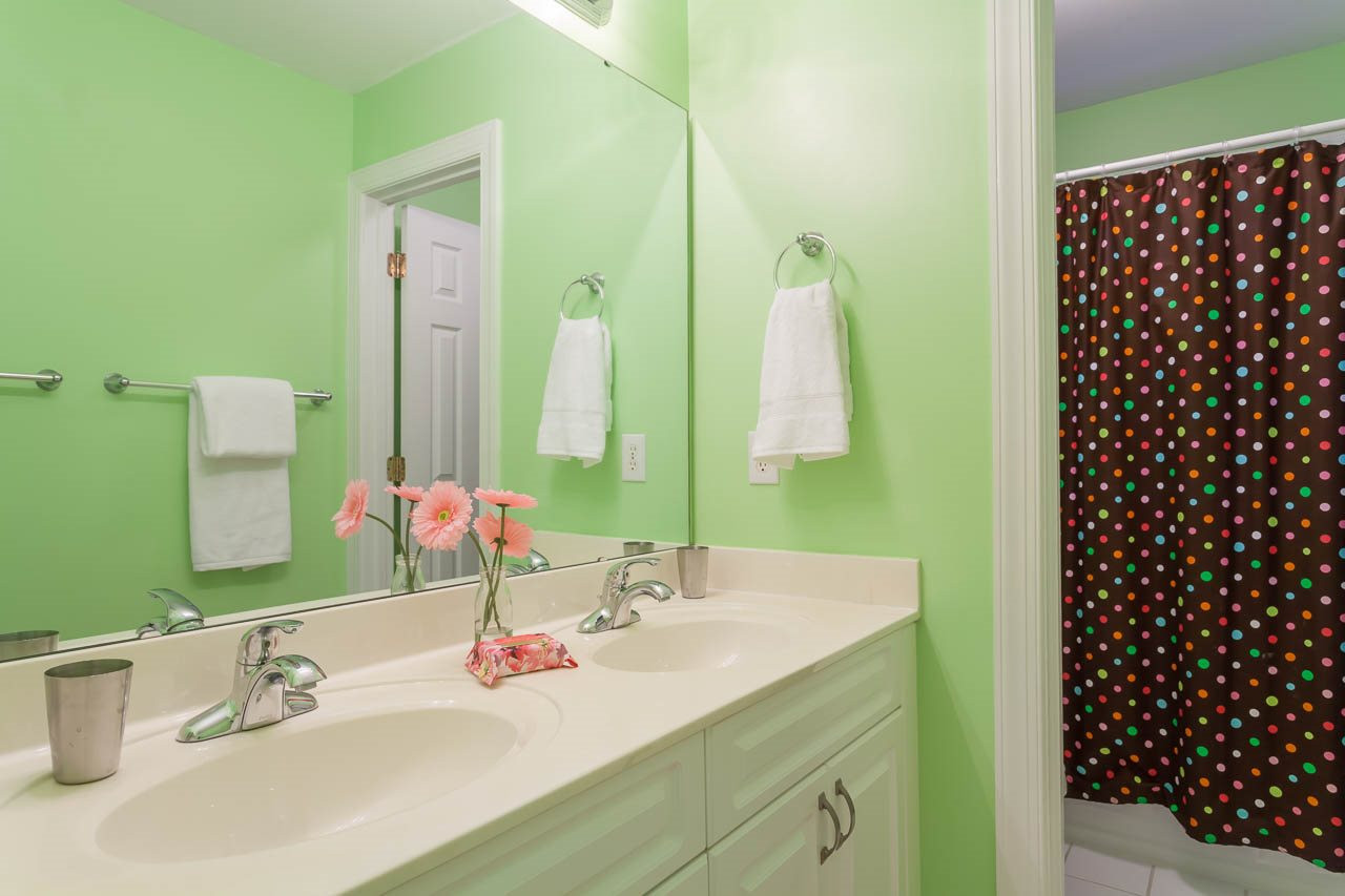 5404 Killarney Hope Drive Raleigh, NC 27613 - Photo 14 of 22 Full bath with dual vanity and tub/shower combo. Bath