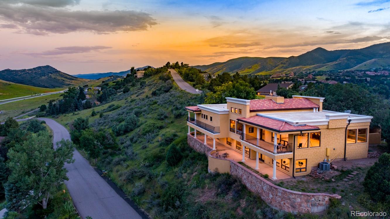 an aerial view of a house with a garden