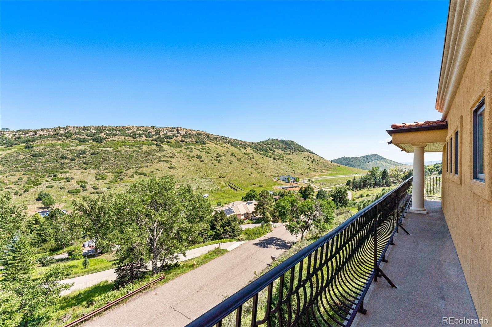5970 Crestbrook Drive Morrison, CO 80465 - Photo 18 of 34 a view of a balcony with an outdoor space