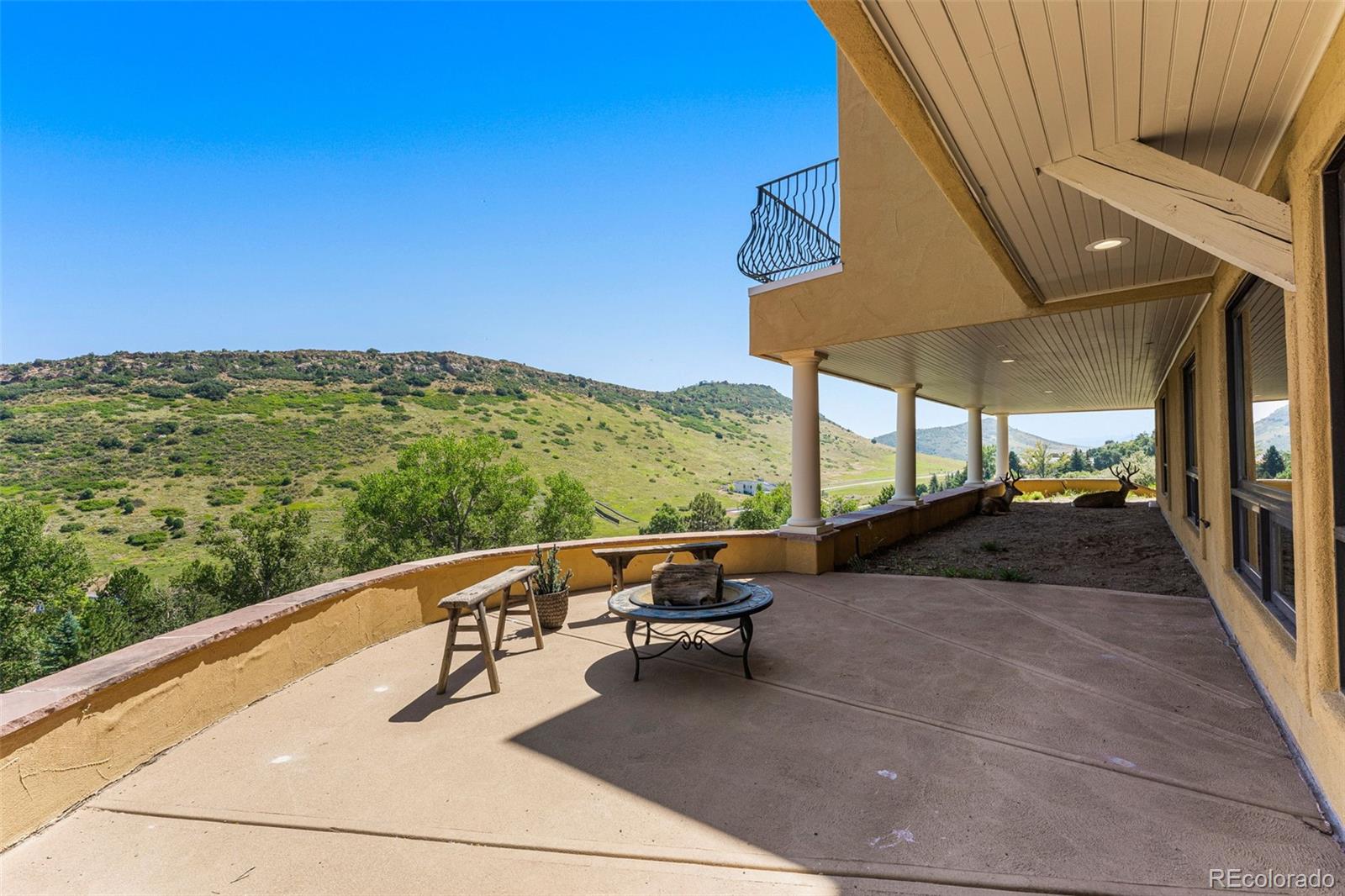 5970 Crestbrook Drive Morrison, CO 80465 - Photo 28 of 34 a view of a two chairs in the balcony