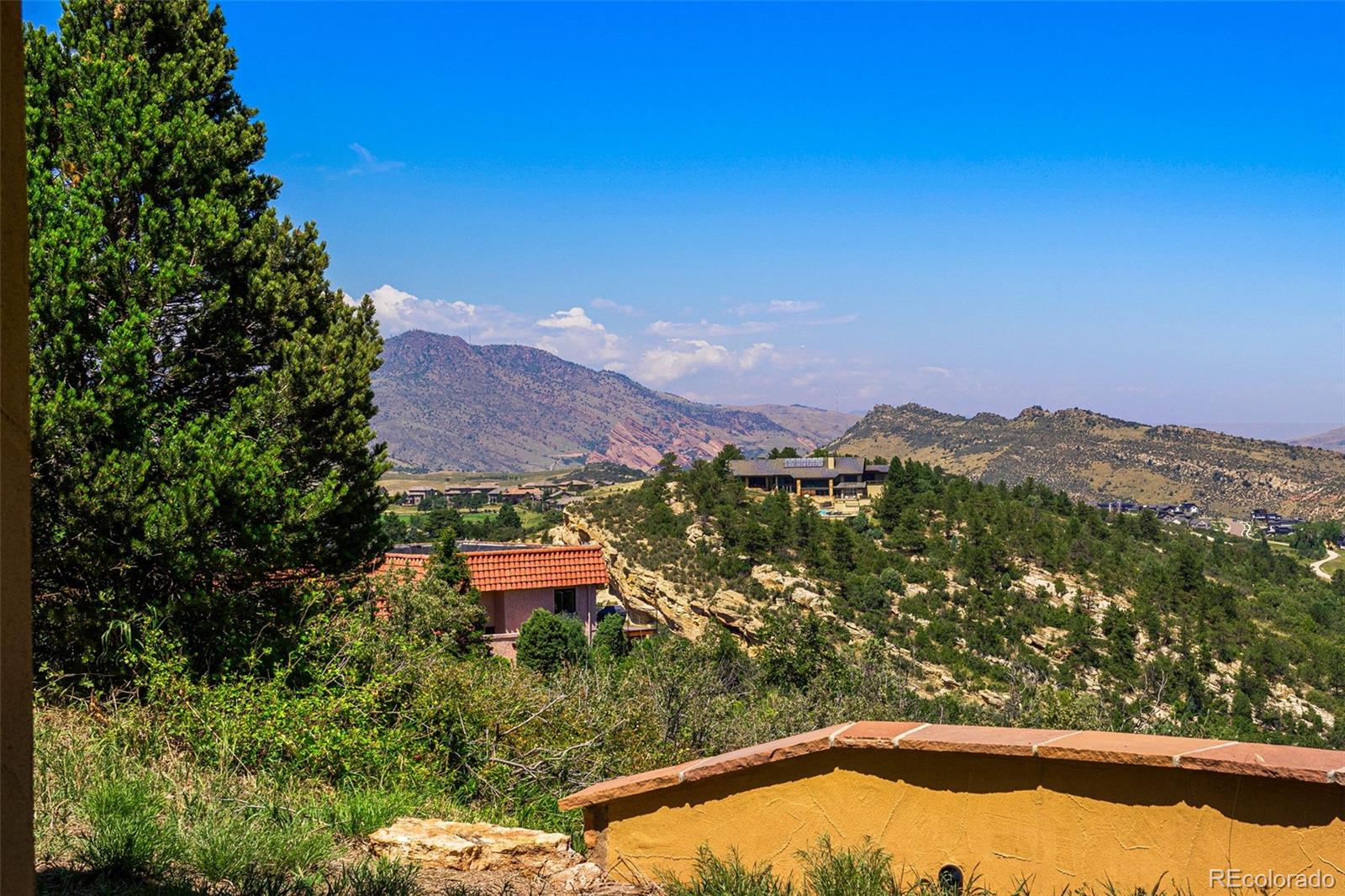 5970 Crestbrook Drive Morrison, CO 80465 - Photo 29 of 34 a view of a lake with a mountain in the background