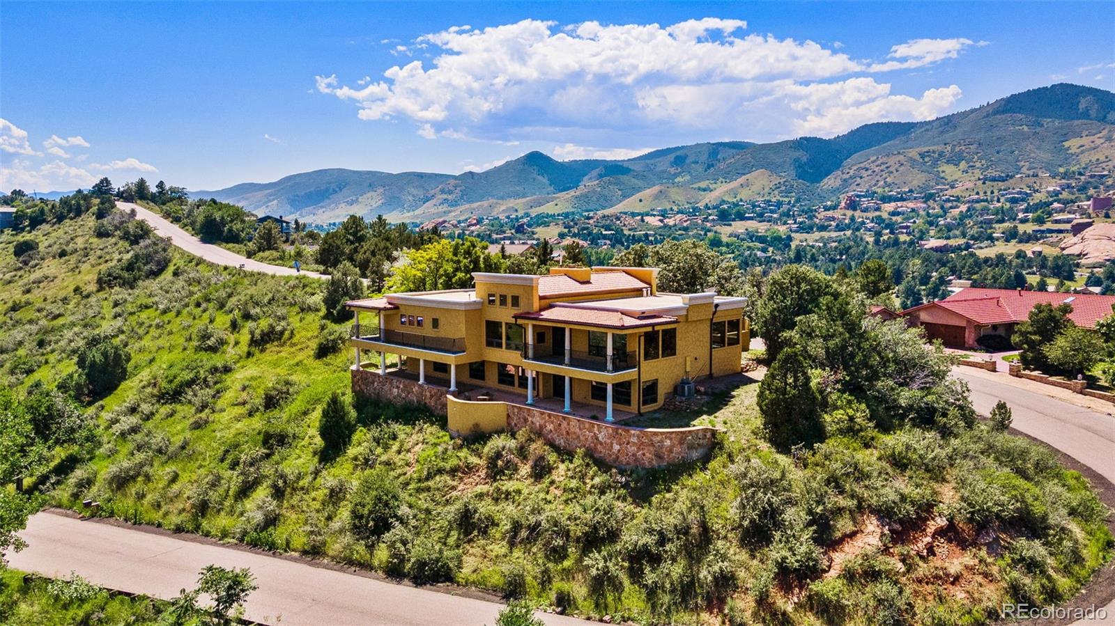 5970 Crestbrook Drive Morrison, CO 80465 - Photo 31 of 34 a view of a city with a building in the background