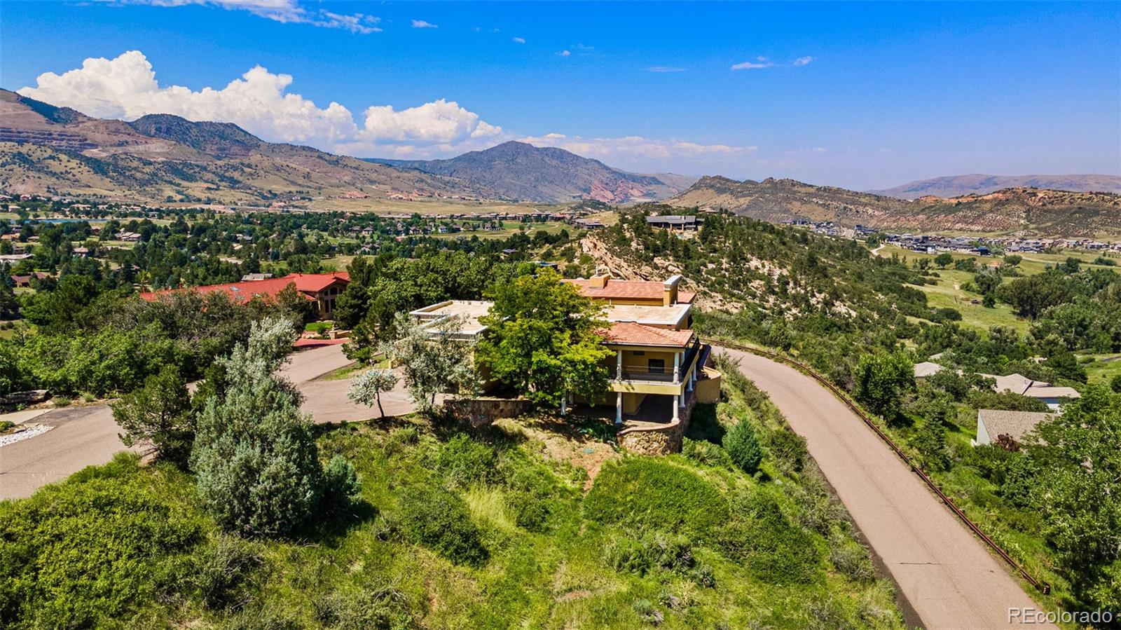 5970 Crestbrook Drive Morrison, CO 80465 - Photo 32 of 34 a view of a city with mountain