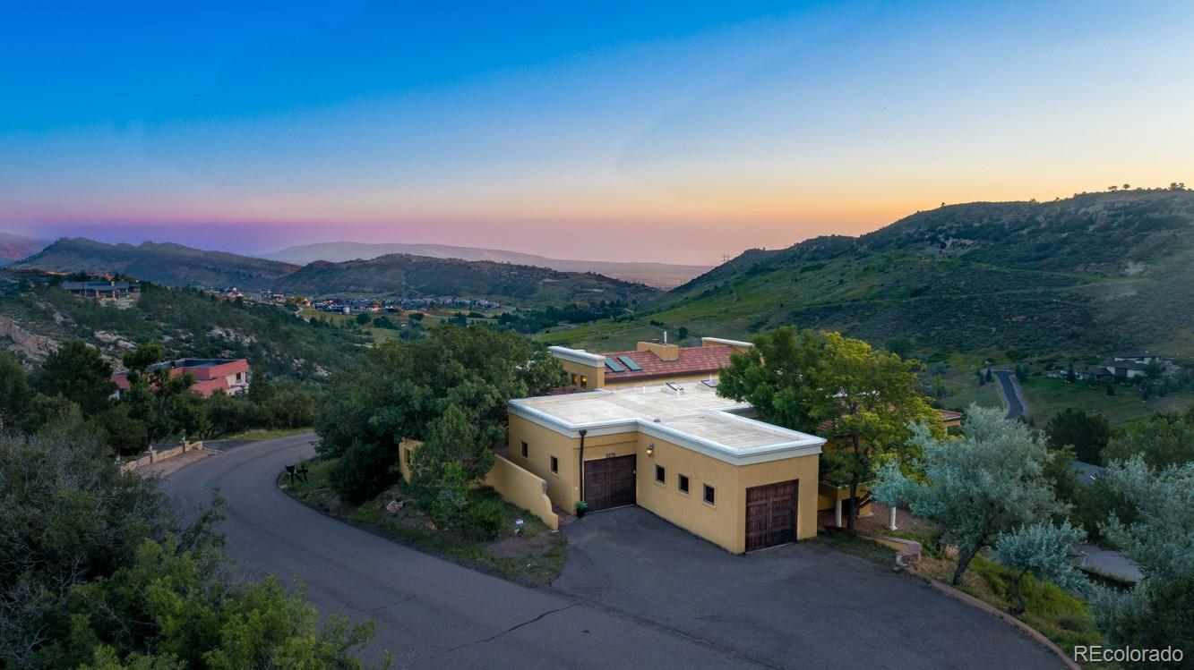 5970 Crestbrook Drive Morrison, CO 80465 - Photo 33 of 34 a view of a city with mountain